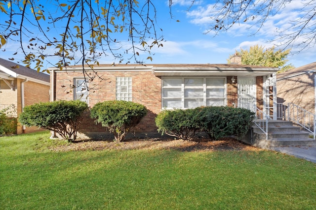 view of front facade with a front yard