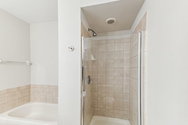 bathroom with independent shower and bath