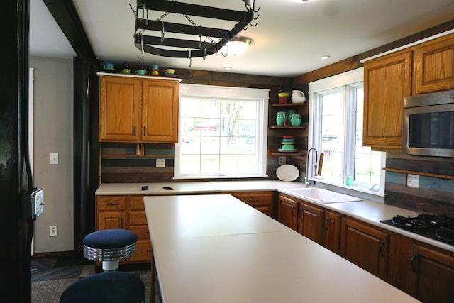 kitchen with sink and black gas stovetop