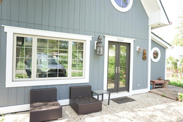 doorway to property featuring french doors