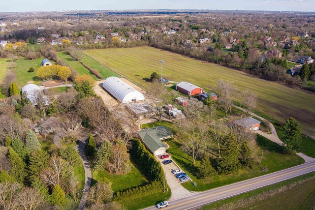 view of horse barn featuring a rural view