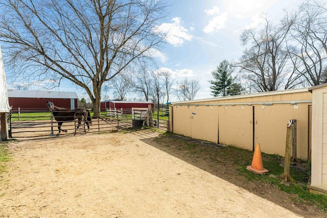 view of yard with an outbuilding and an exterior structure