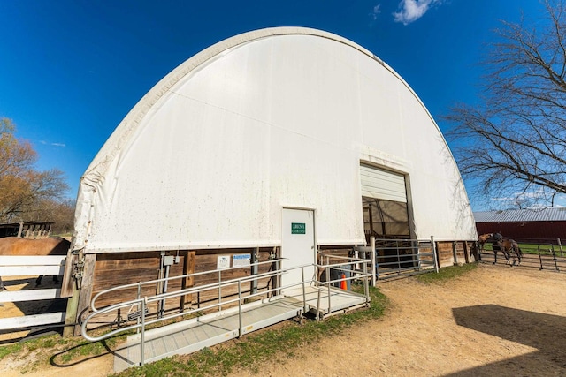 view of outdoor structure featuring an outbuilding and an exterior structure