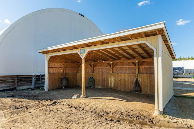 view of outbuilding with an outbuilding and a detached carport