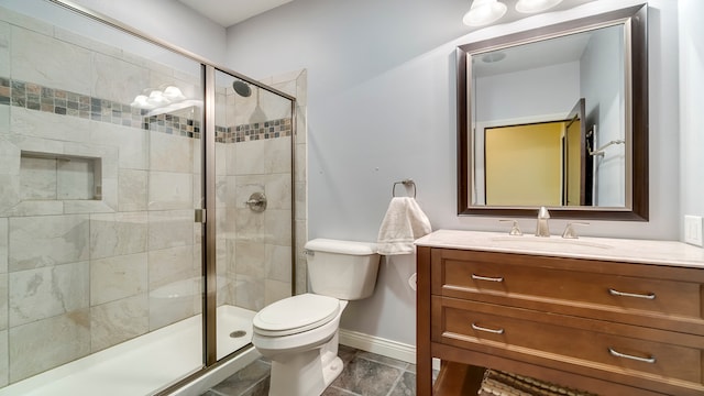 bathroom with walk in shower, tile flooring, toilet, and oversized vanity