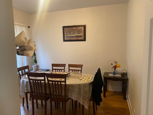 dining room featuring dark hardwood / wood-style floors