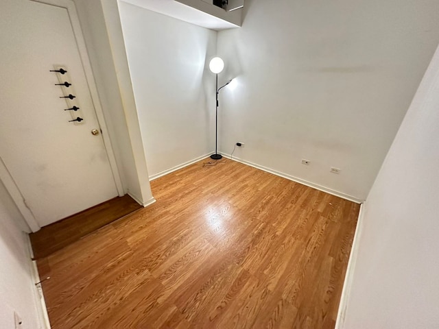 spare room with light wood-type flooring