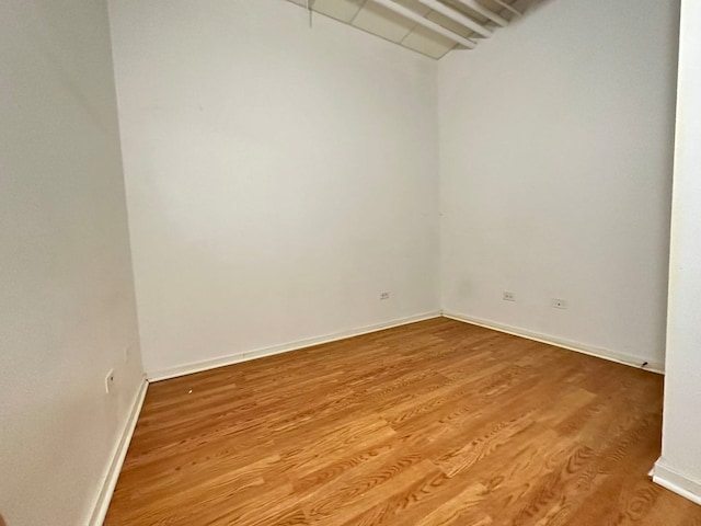 empty room with light hardwood / wood-style floors