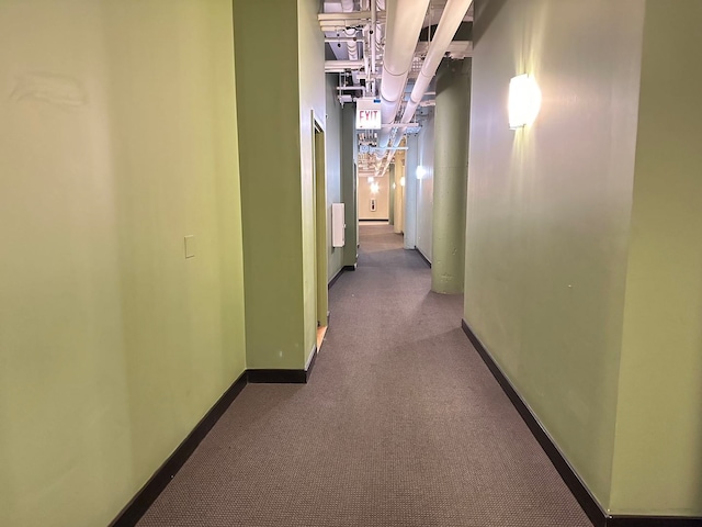 corridor with dark carpet