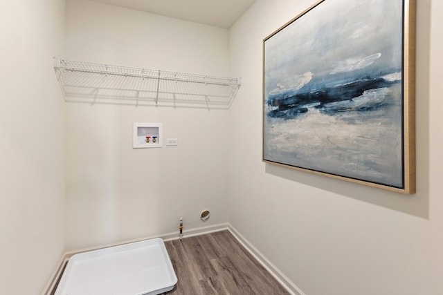 washroom with washer hookup, gas dryer hookup, and hardwood / wood-style floors