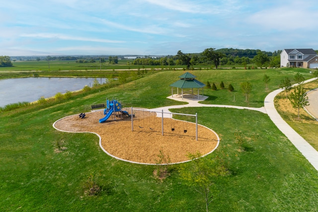 view of property's community featuring a water view and a playground