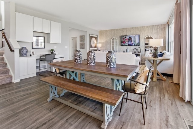 dining area with wood-type flooring