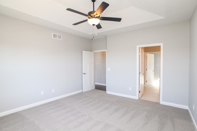 interior space with ceiling fan and a high ceiling