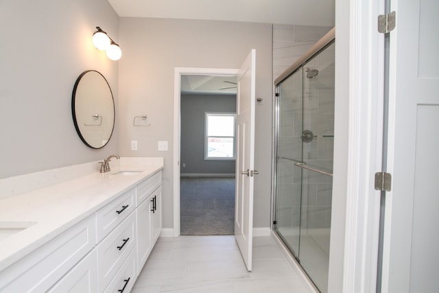 bathroom featuring walk in shower, tile flooring, and double sink vanity