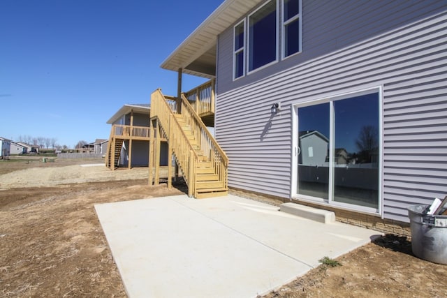 back of house with a patio