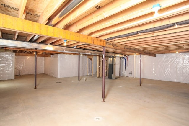 basement featuring heating utilities