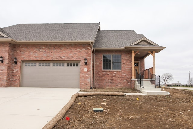 view of front of property featuring a garage