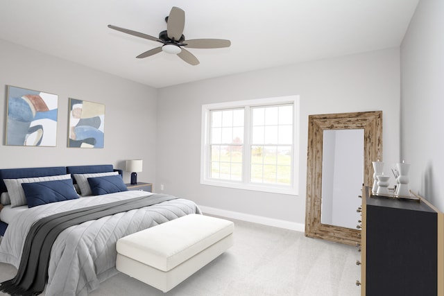 bedroom featuring ceiling fan and light colored carpet