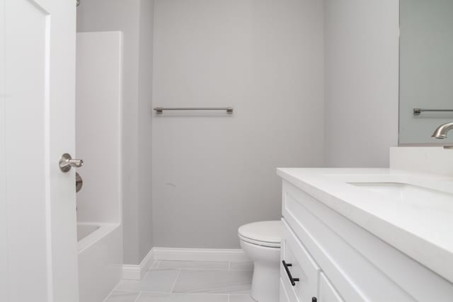 full bathroom with toilet, washtub / shower combination, tile floors, and vanity