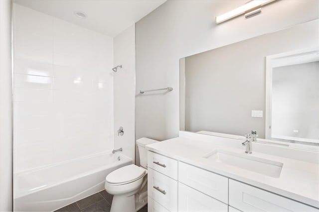 full bathroom featuring shower / bathing tub combination, toilet, vanity with extensive cabinet space, and tile floors