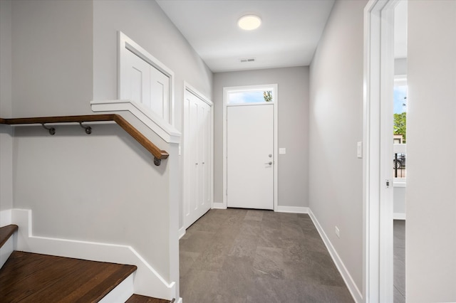 foyer entrance with tile floors