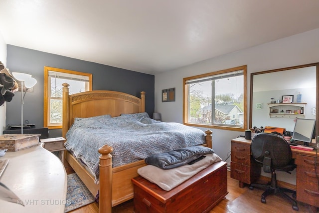 bedroom featuring wood finished floors