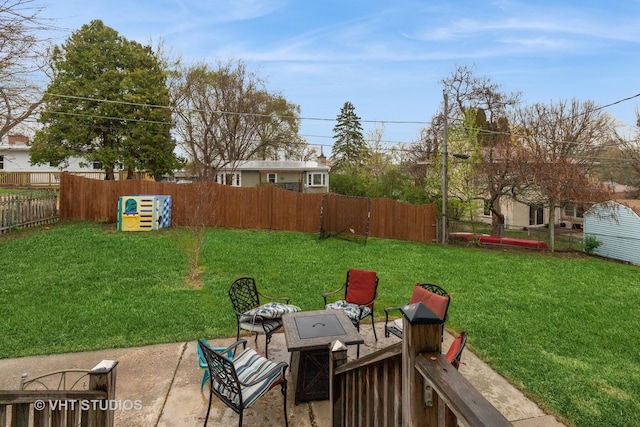 view of yard with a patio area and a fenced backyard