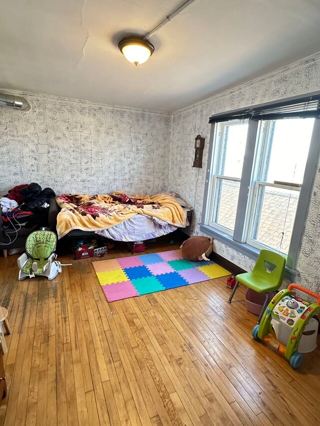 unfurnished bedroom featuring light wood-type flooring