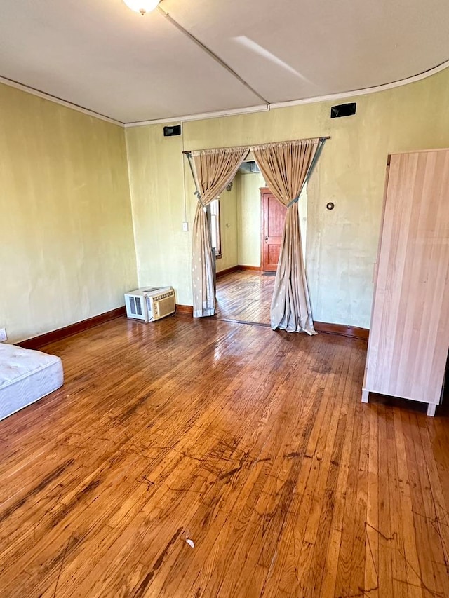 empty room featuring dark hardwood / wood-style flooring