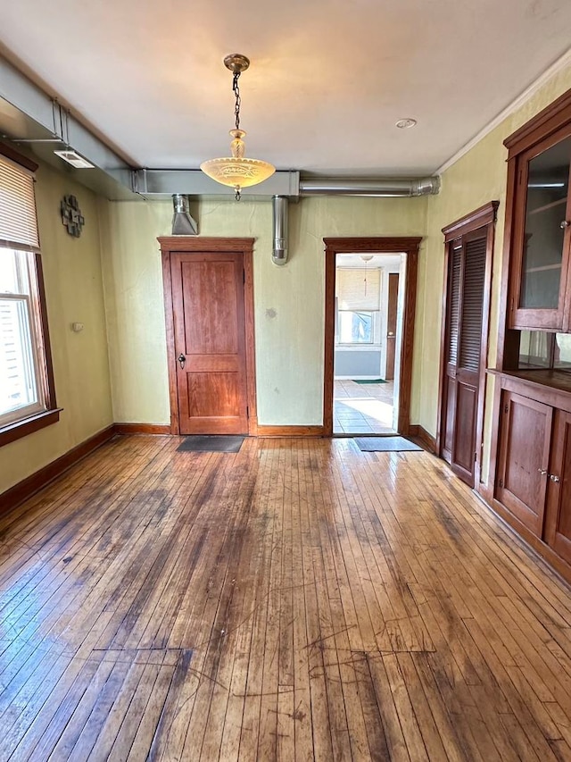 empty room featuring hardwood / wood-style flooring