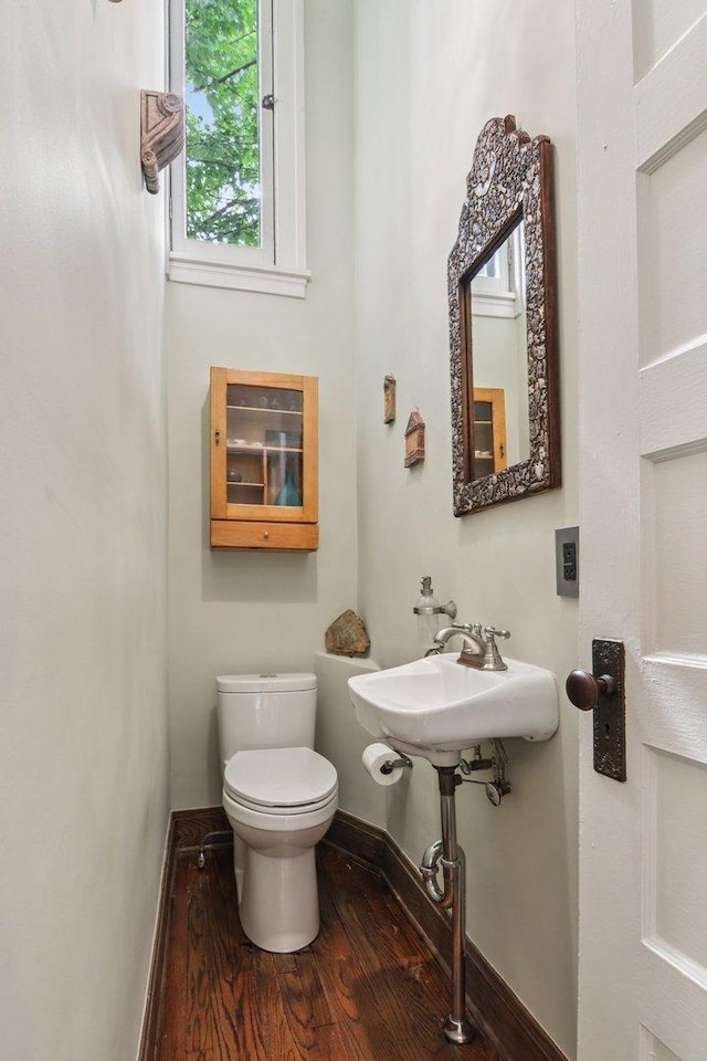 412 Pleasant St, Oak Park, IL 60302 - bathroom featuring wood finished floors and toilet