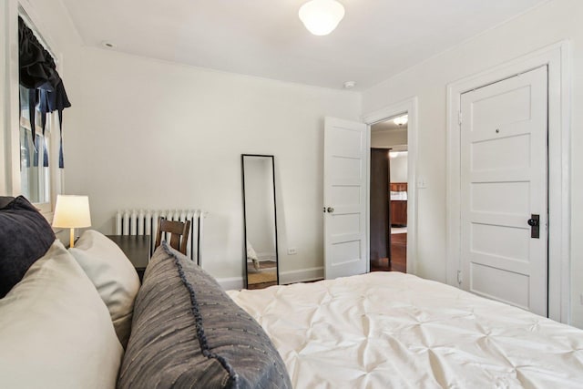 412 Pleasant St, Oak Park, IL 60302 - bedroom featuring radiator heating unit and baseboards