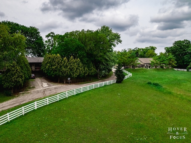 view of yard with a rural view