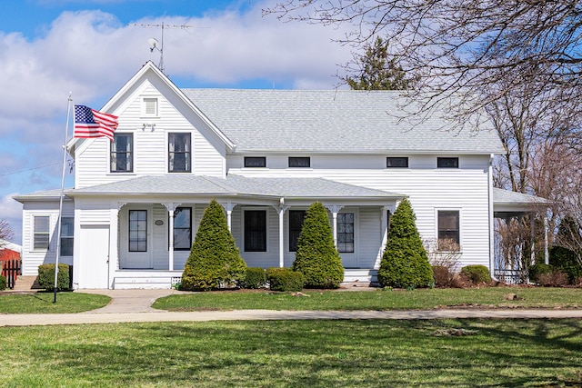 view of front of home with a front lawn