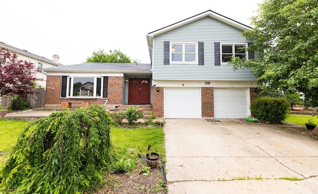 39 Mill Pond Dr, Glendale Heights, IL 60139 - tri-level home featuring brick siding, a garage, and concrete driveway
