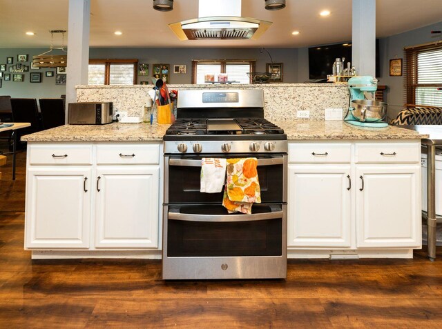 39 Mill Pond Dr, Glendale Heights, IL 60139 - kitchen with stainless steel appliances, custom exhaust hood, healthy amount of natural light, white cabinetry, and recessed lighting
