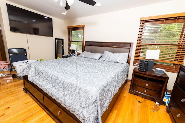 39 Mill Pond Dr, Glendale Heights, IL 60139 - bedroom with wood finished floors, multiple windows, recessed lighting, and a ceiling fan