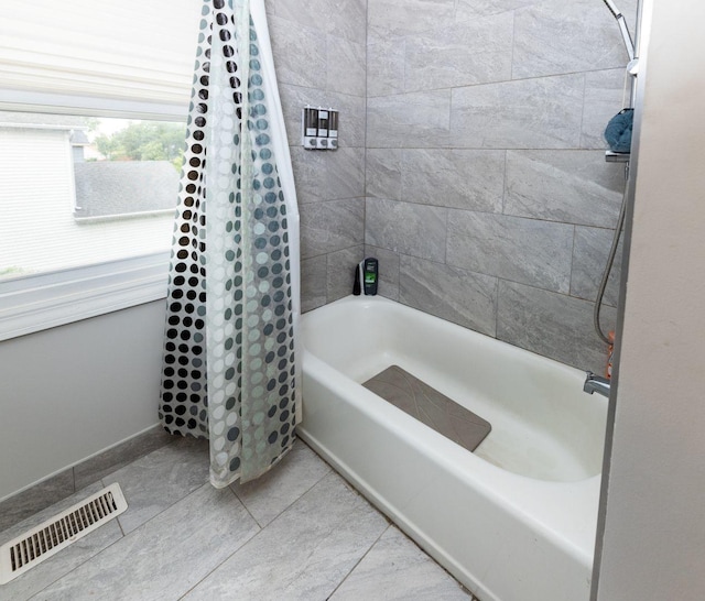 39 Mill Pond Dr, Glendale Heights, IL 60139 - bathroom featuring shower / tub combo