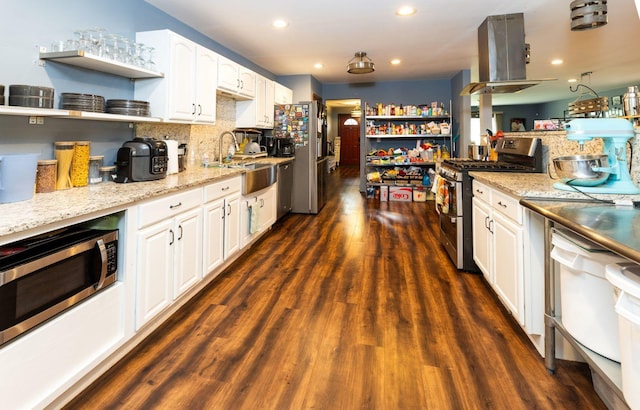 39 Mill Pond Dr, Glendale Heights, IL 60139 - kitchen featuring appliances with stainless steel finishes, island range hood, open shelves, dark wood-style floors, and white cabinets
