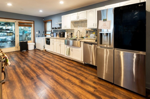 39 Mill Pond Dr, Glendale Heights, IL 60139 - kitchen with stainless steel appliances, recessed lighting, white cabinets, dark wood-style flooring, and decorative backsplash
