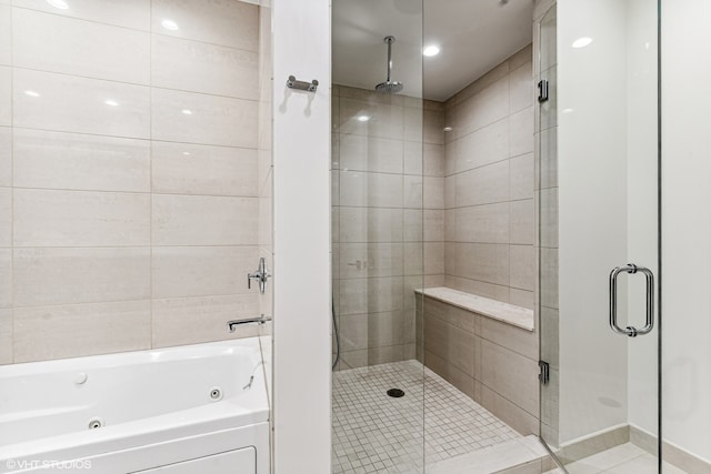 bathroom with independent shower and bath