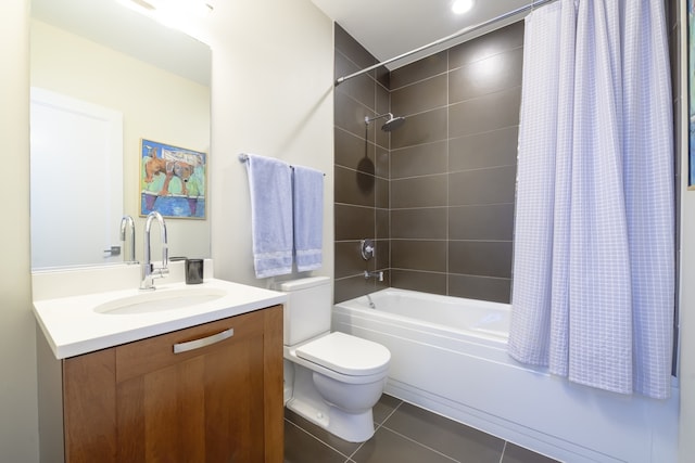 full bathroom with tile floors, toilet, shower / bath combo, and vanity