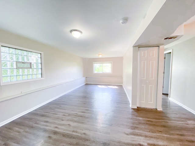 spare room featuring hardwood / wood-style floors