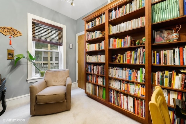 living area with carpet