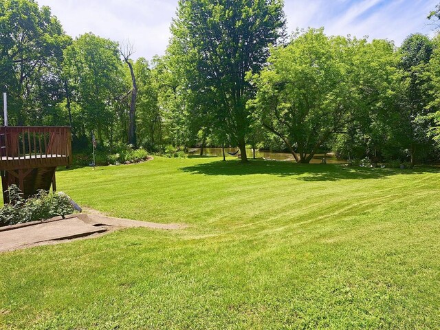 view of yard featuring a deck