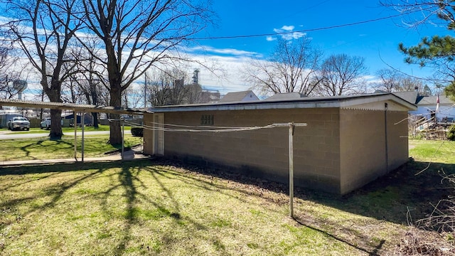 view of home's exterior with a lawn