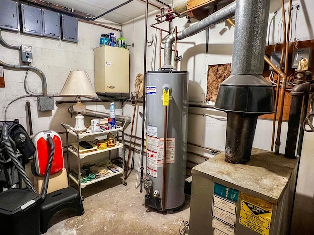 utility room featuring water heater