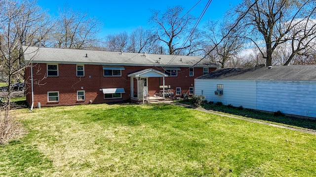 back of house with a yard