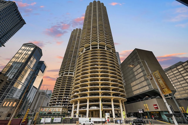 view of outdoor building at dusk