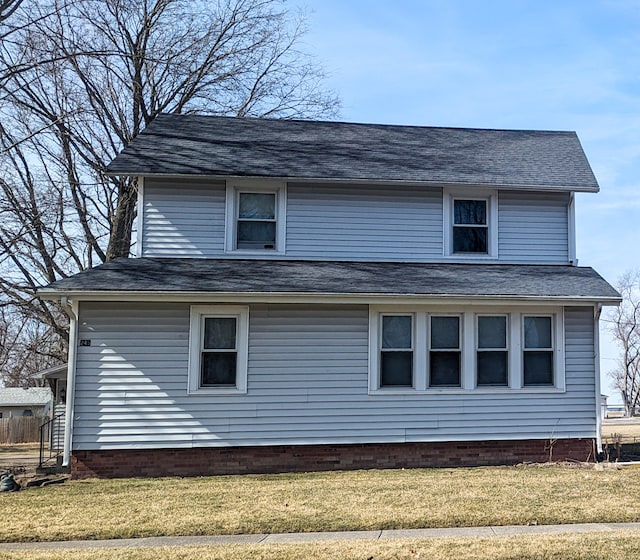 exterior space with a front lawn